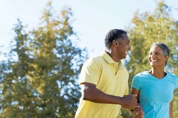 Older couple walking outdoors