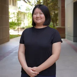 Kelly Feng Headshot in TLSB Courtyard