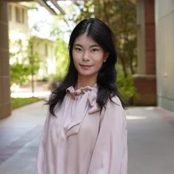 Lanxin Yang Headshot taken in the courtyard of the TLSB Building